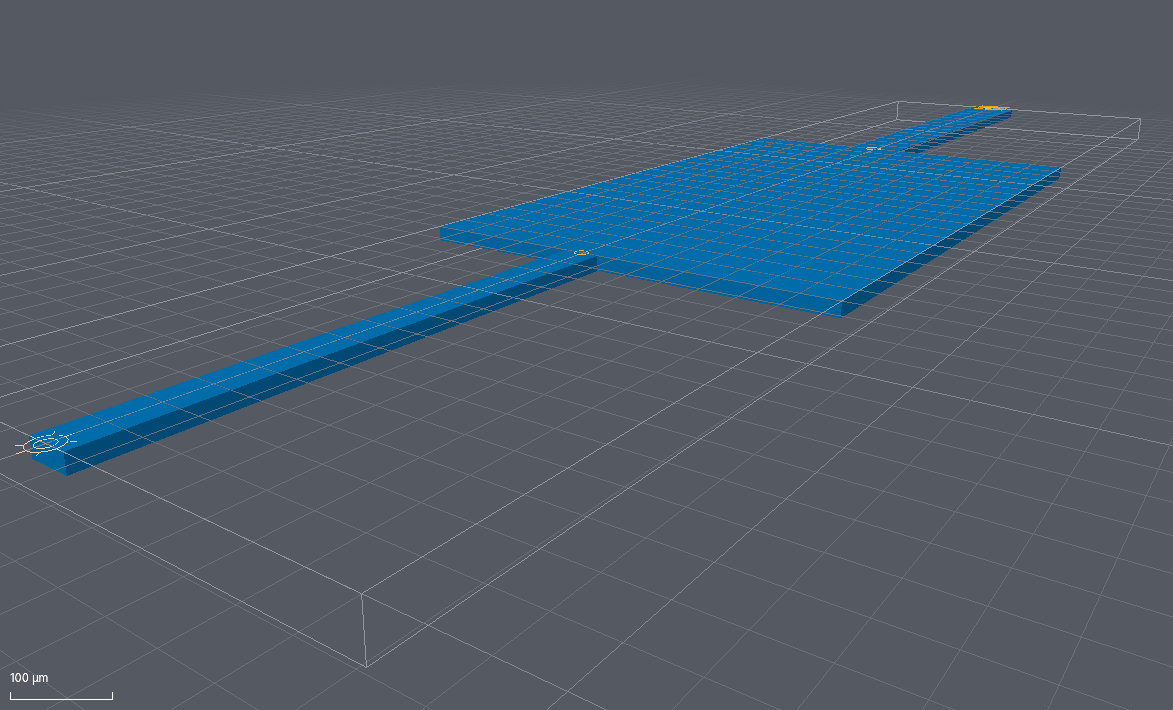The finished chip in the 3D orbit view from a low angle: the chamber and the two channels drawn with their depth, inside the wireframe box of the slab