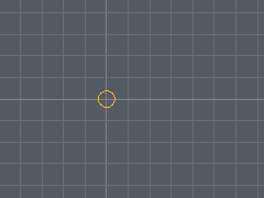 A single point in an empty document, drawn as a small amber circle on the grid with no geometry under it